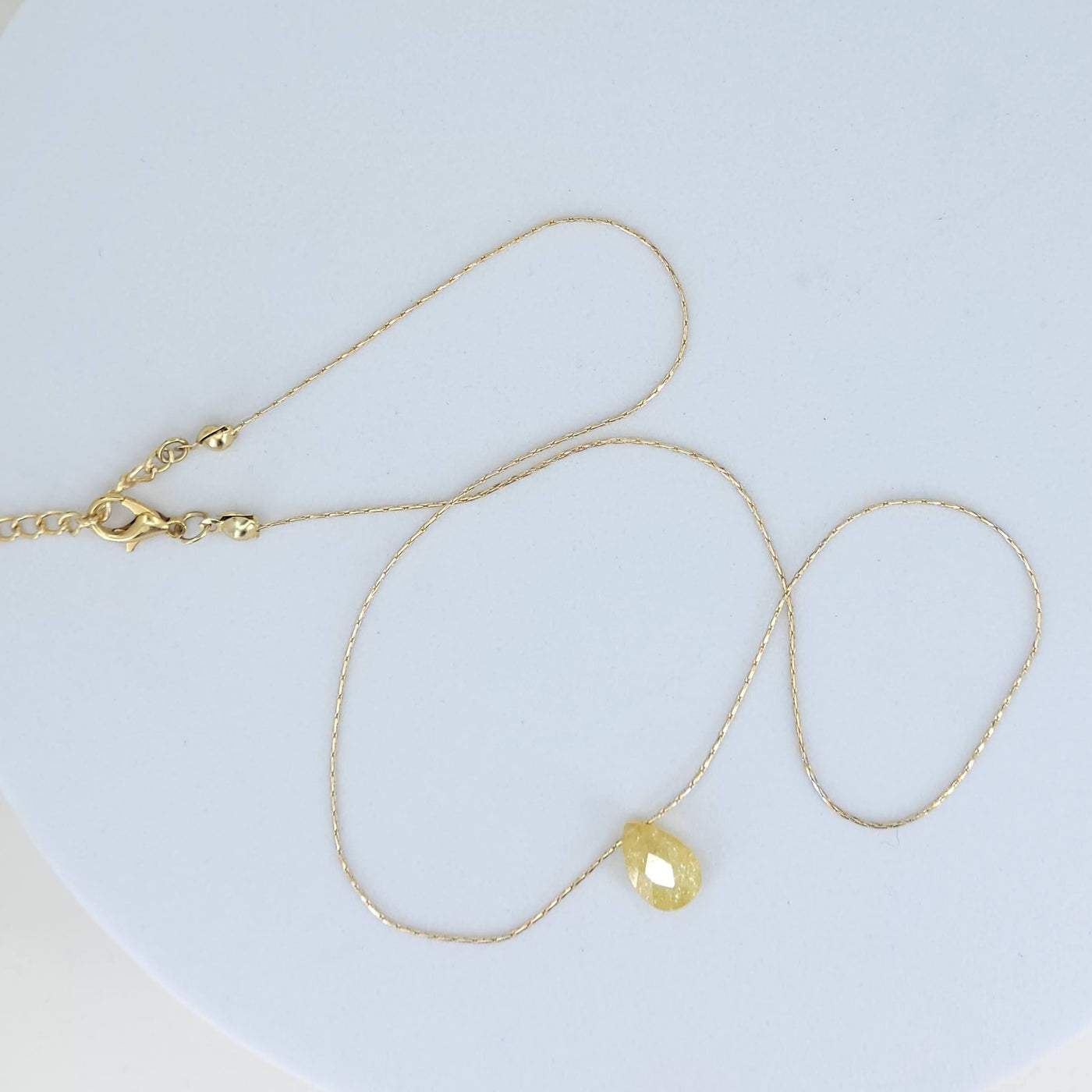 teardrop necklace with faceted stone and snake chain