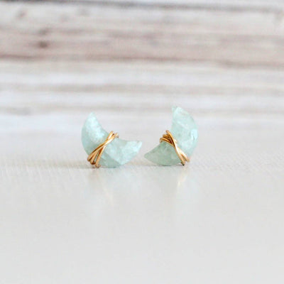 earring studs with aquamarine gemstones in a moon shape wrapped in 14k gold fill earring wire