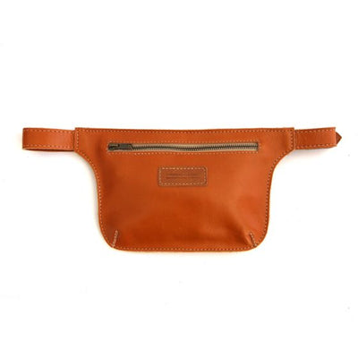 Front of camel color brown leather belt bag with single top zipper
