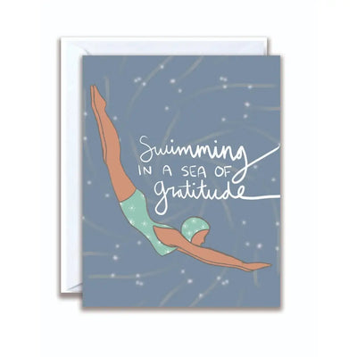 greeting card with a design of a swimmer taking a dive and the words, "swimming in a sea of gratitude"