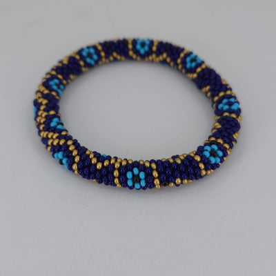 crocheted beaded bracelet with evil eyes
