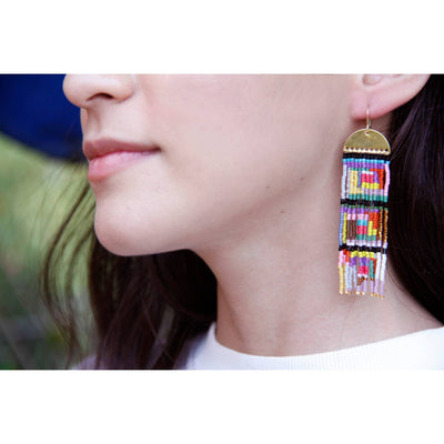 color pop geometric headwoven beaded earrings on a model