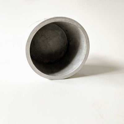 Interior of the concrete planter; empty and hollow