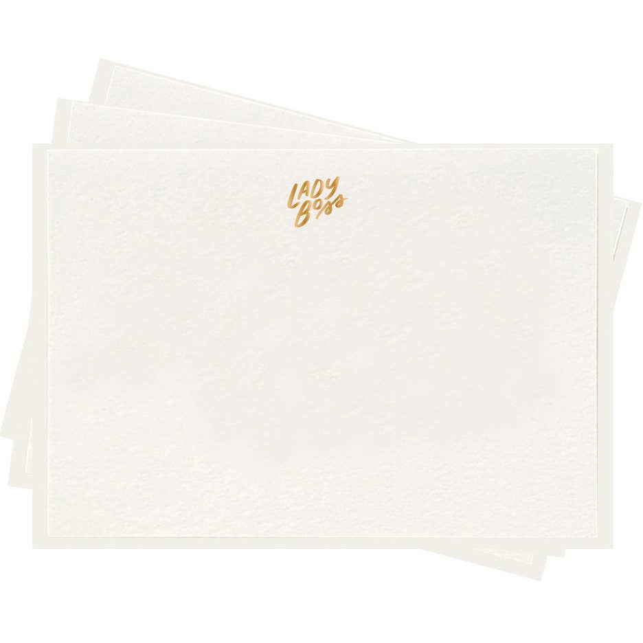stack of white flat notes with small gold foil detailing that says lady boss