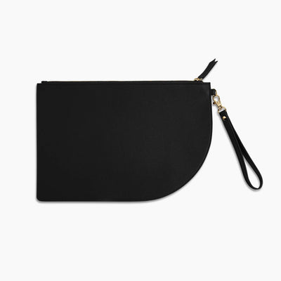 Black vegan leather flat clutch bag with gold zipper and removable wrist strap