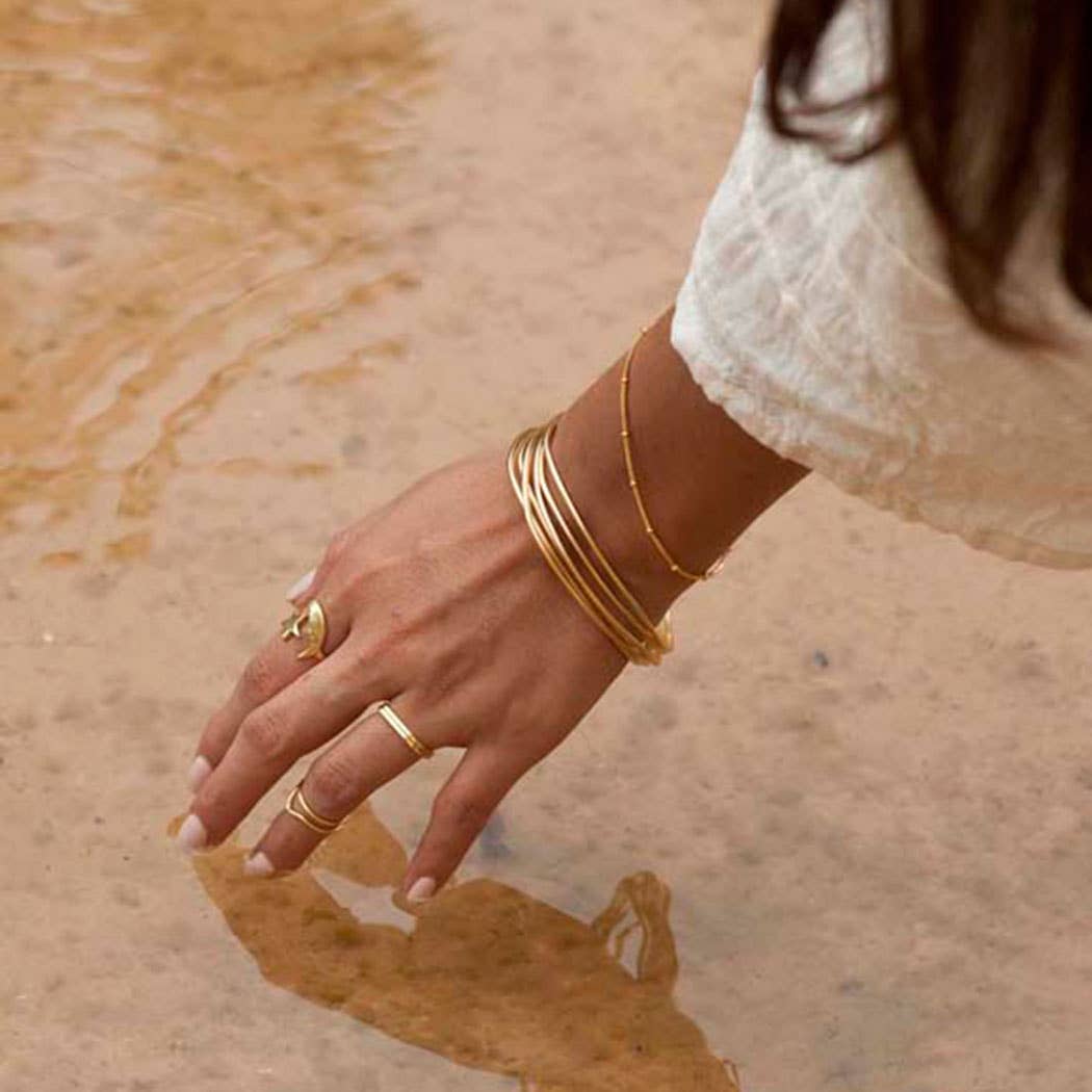 gold wave bangle bracelets set of 4