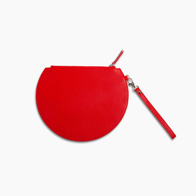 Bright red 3/4 moon shaped flat clutch bag with silver zipper and removable wristlet