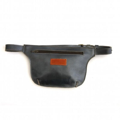 Front of metallic black leather belt bag with single top zipper; maker label in center of bag in camel color leather