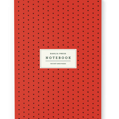 cover of red notebook with tiny black hearts