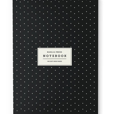 cover of black notebook with tiny white dots