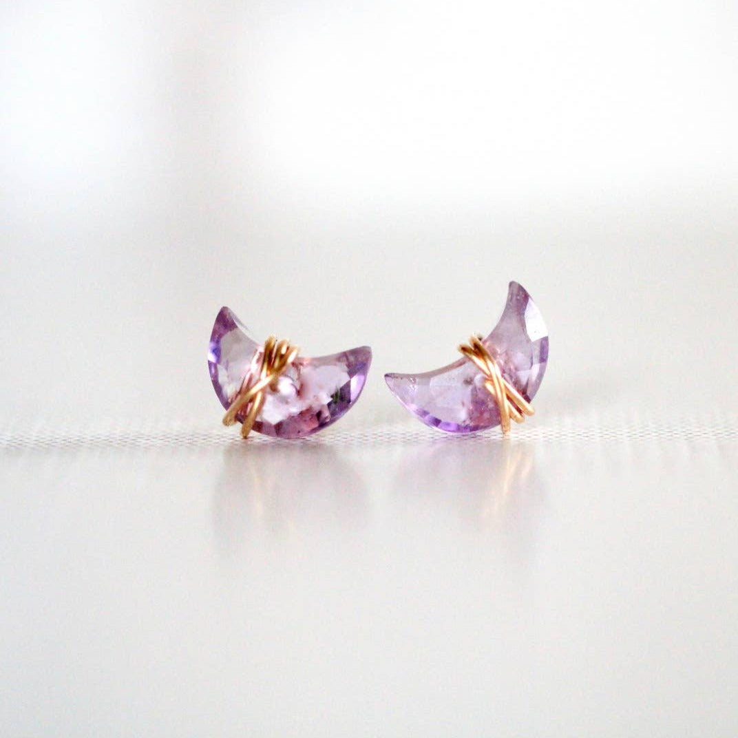 earring studs with amethyst gemstones in a moon shape wrapped in 14k rose gold fill earring wire