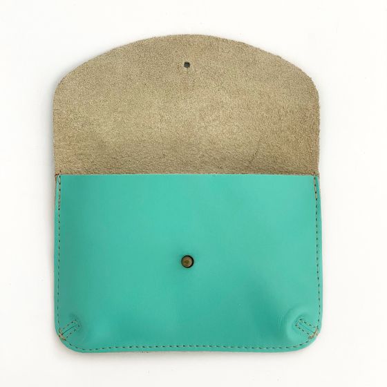 Aqua color leather wallet, opened to reveal super soft unlined interior